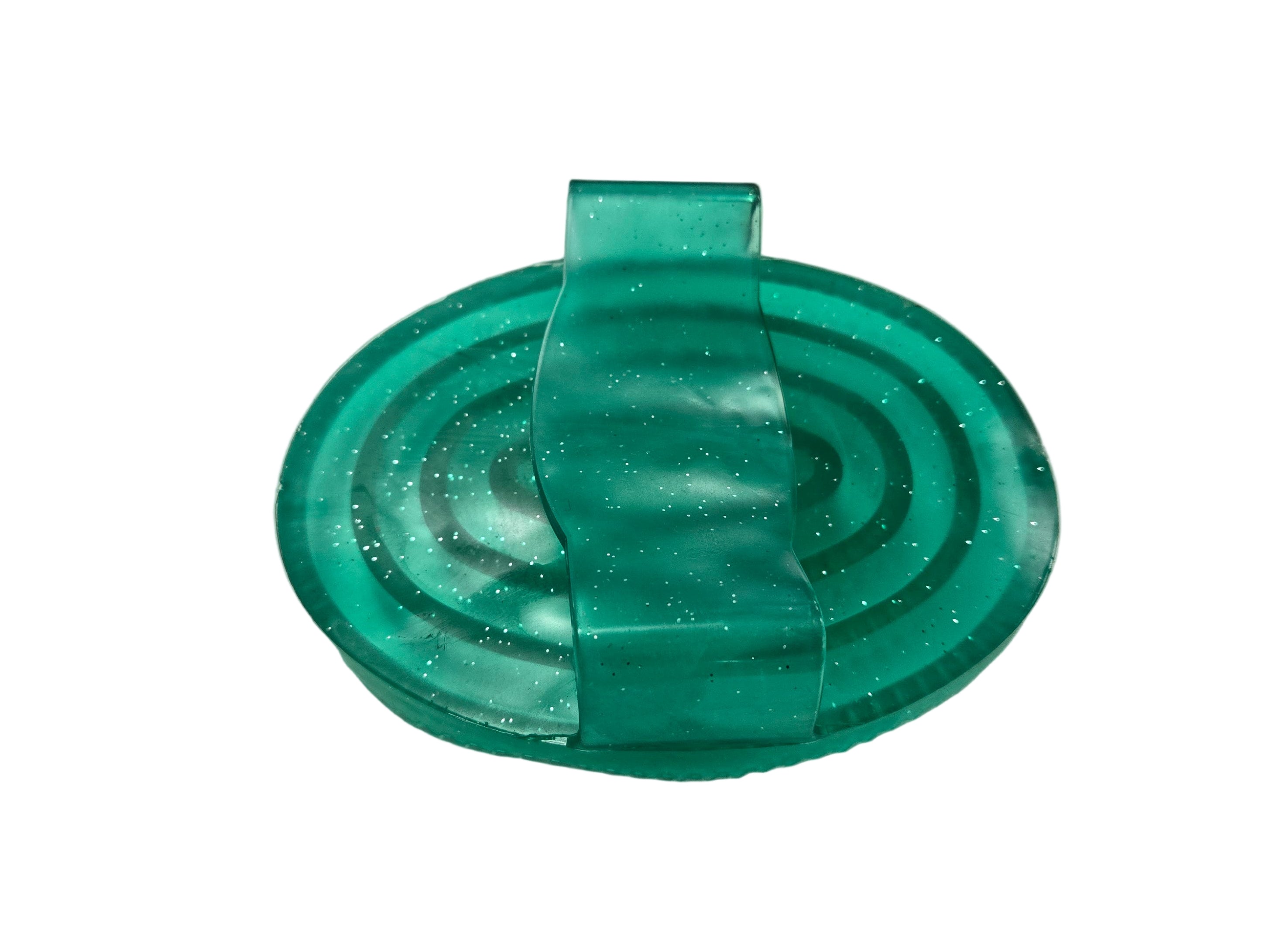 Green plastic component on a white background