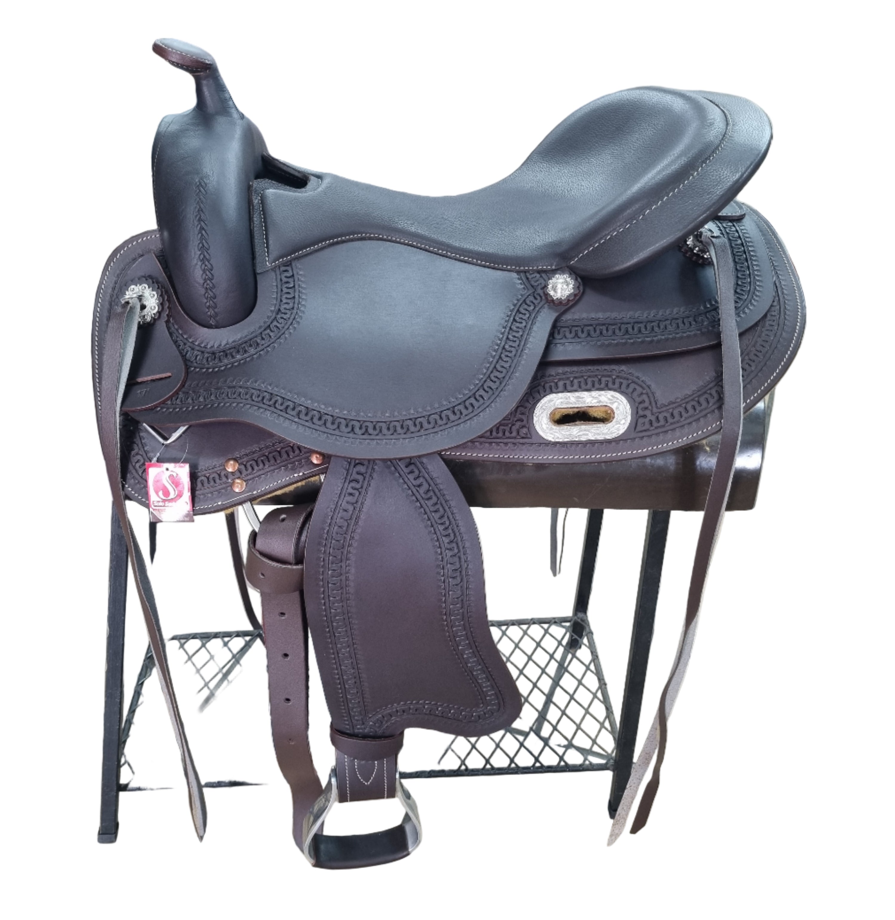 Saddle on a metal stand with a tiled floor background