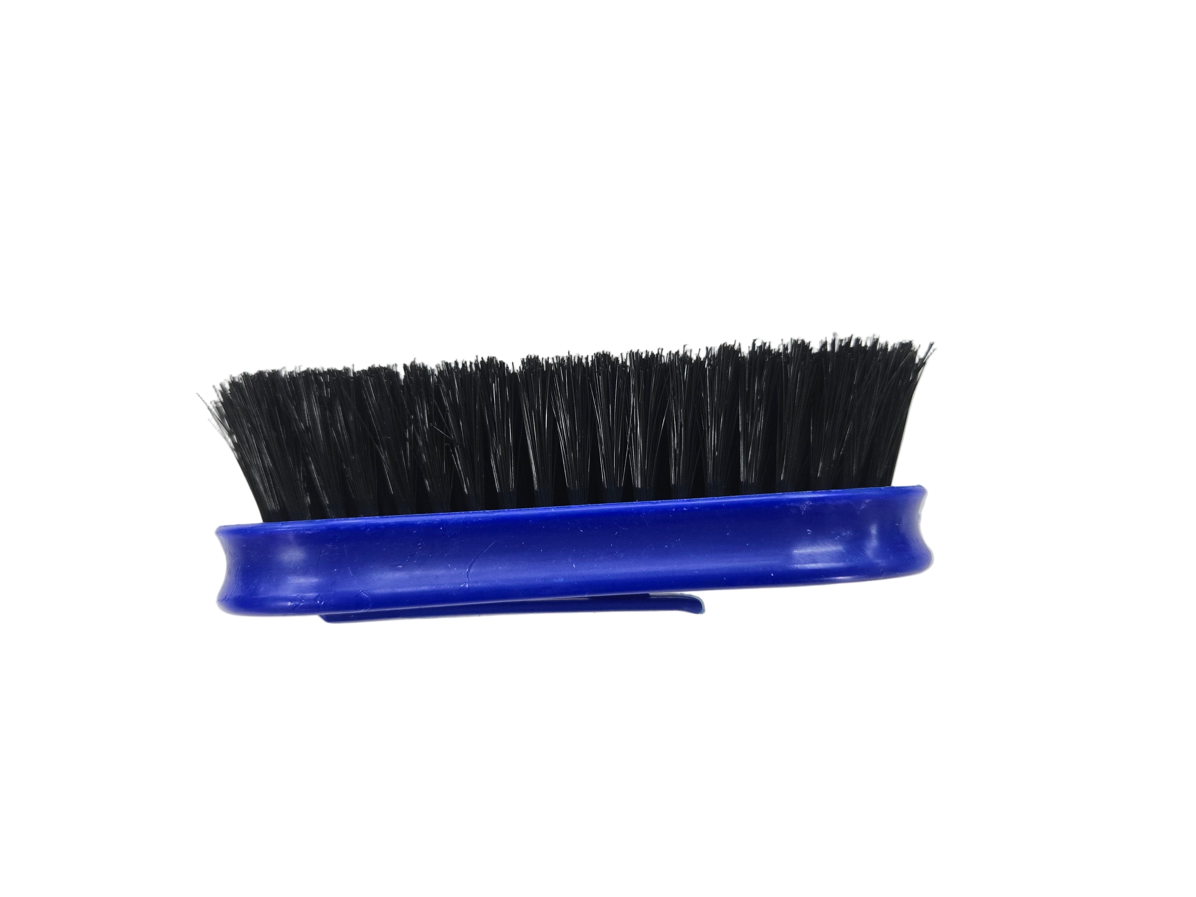 Blue brush with black bristles on a white background