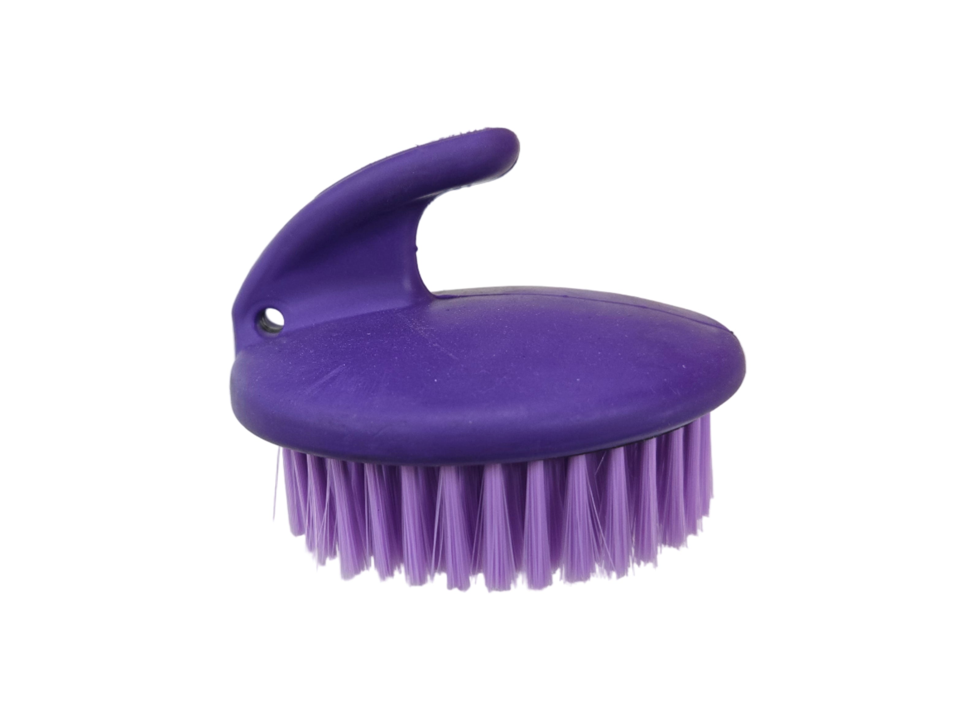 Purple brush with a handle on a white surface