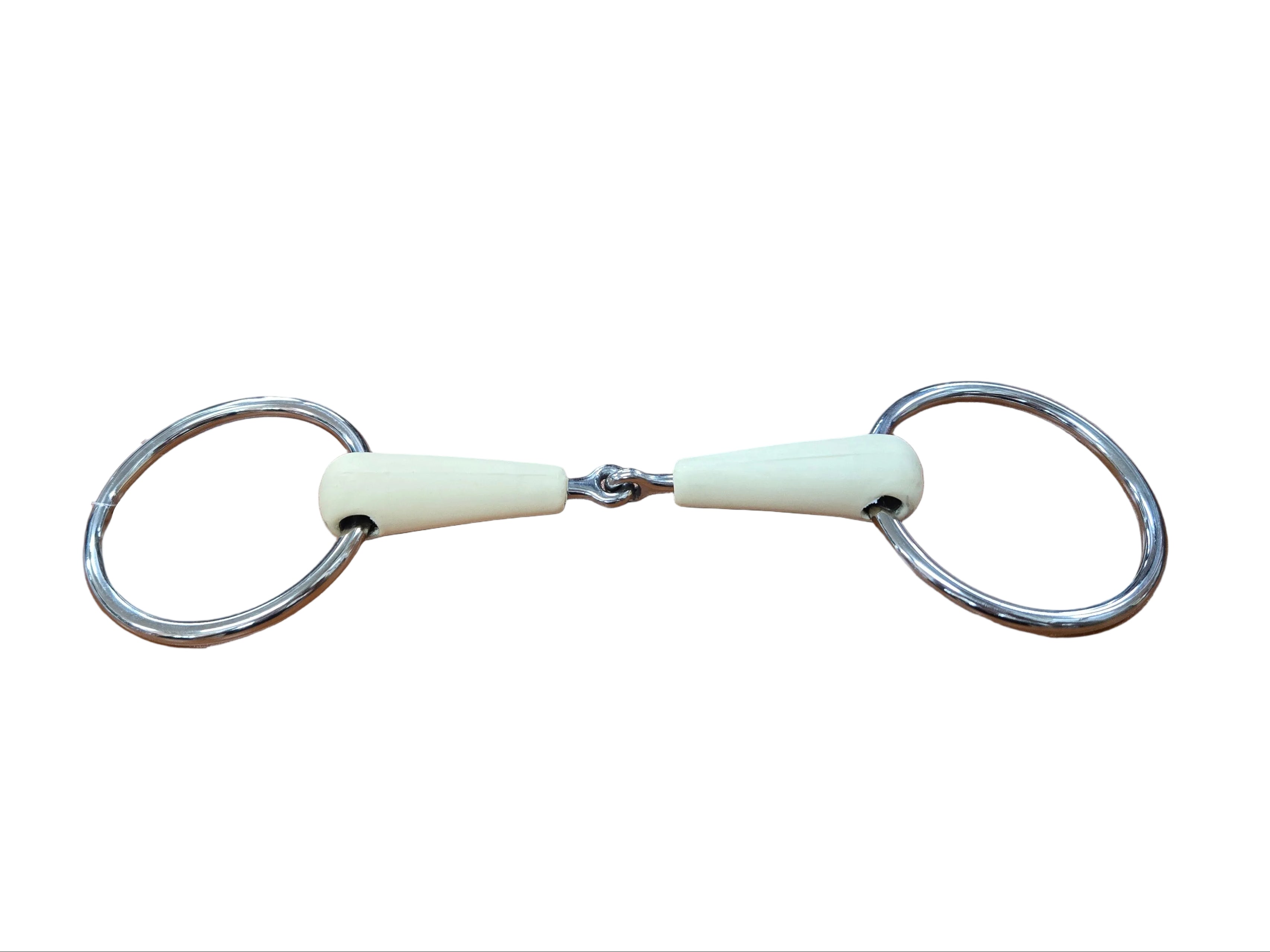 Metal snaffle bit on a wooden desk with a keyboard in the background