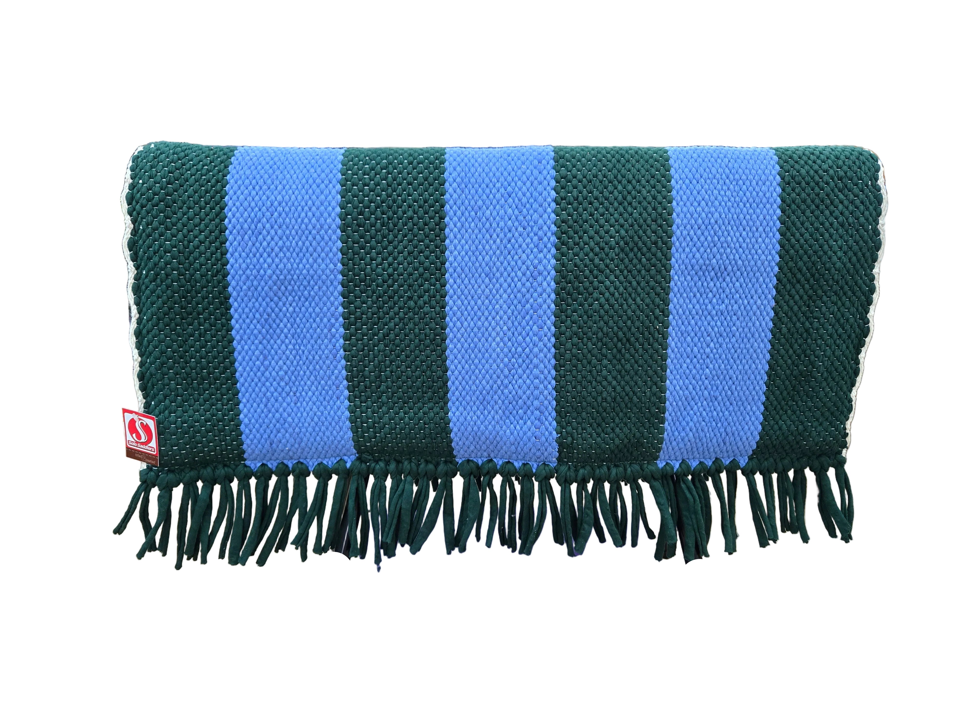 Striped green and blue blanket with fringes on a chair in a store setting
